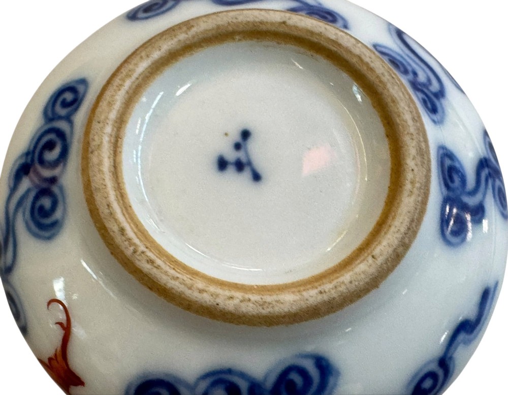 A squatted Chinese porcelain brush washer decorated with underglaze cobalt blue clouds and copper red bats on a white glazed ground. View VI