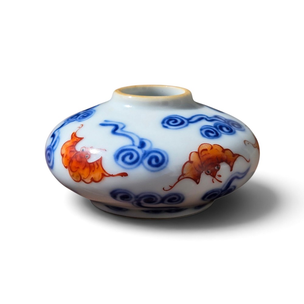 A squatted Chinese porcelain brush washer decorated with underglaze cobalt blue clouds and copper red bats on a white glazed ground. View VII