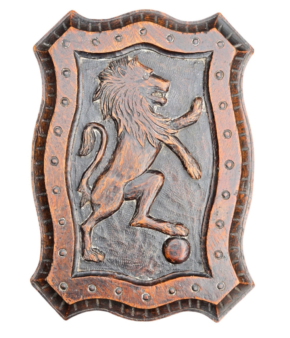 Late 19th-Century Scottish Victorian Carved Oak Occasional Footstool with Heraldic Lion Rampant Motif and Claw-and-Ball Feet View VI