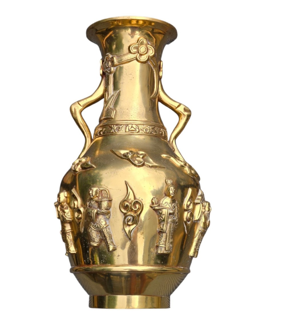 A late 19th-century Chinese brass baluster vase featuring raised high-relief carvings of Daoist figures, clouds, and floral handles. View IX