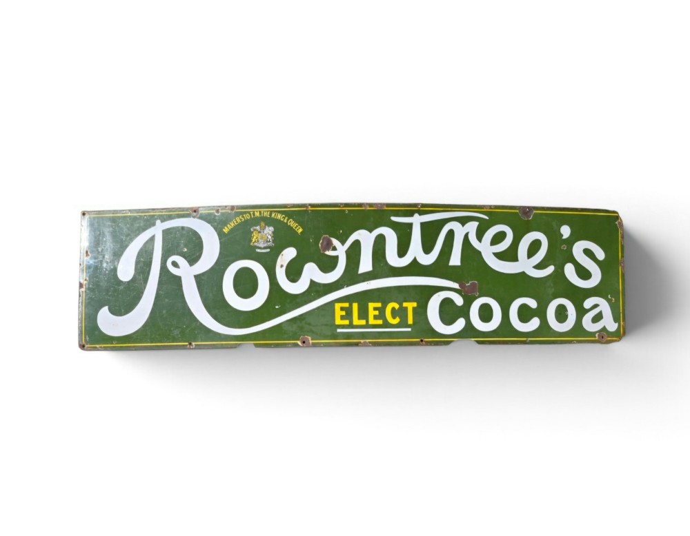 A large rectangular bottle green enamel sign featuring white and yellow typography for Rowntrees Elect Cocoa with a royal crest.