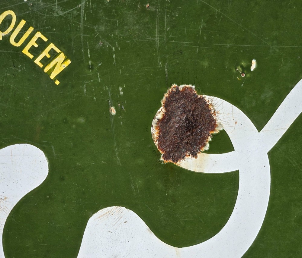 A large rectangular bottle green enamel sign featuring white and yellow typography for Rowntrees Elect Cocoa with a royal crest. View VII