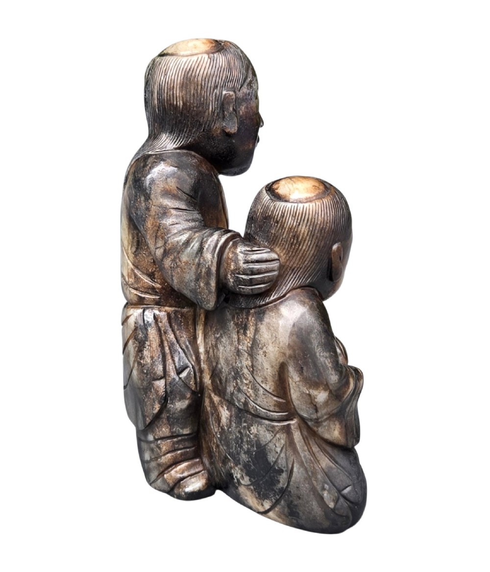 A Rare and Substantial Ming Dynasty Calcified Jade Figural Group of the Hehe Erxian Twins circa 1600 View II
