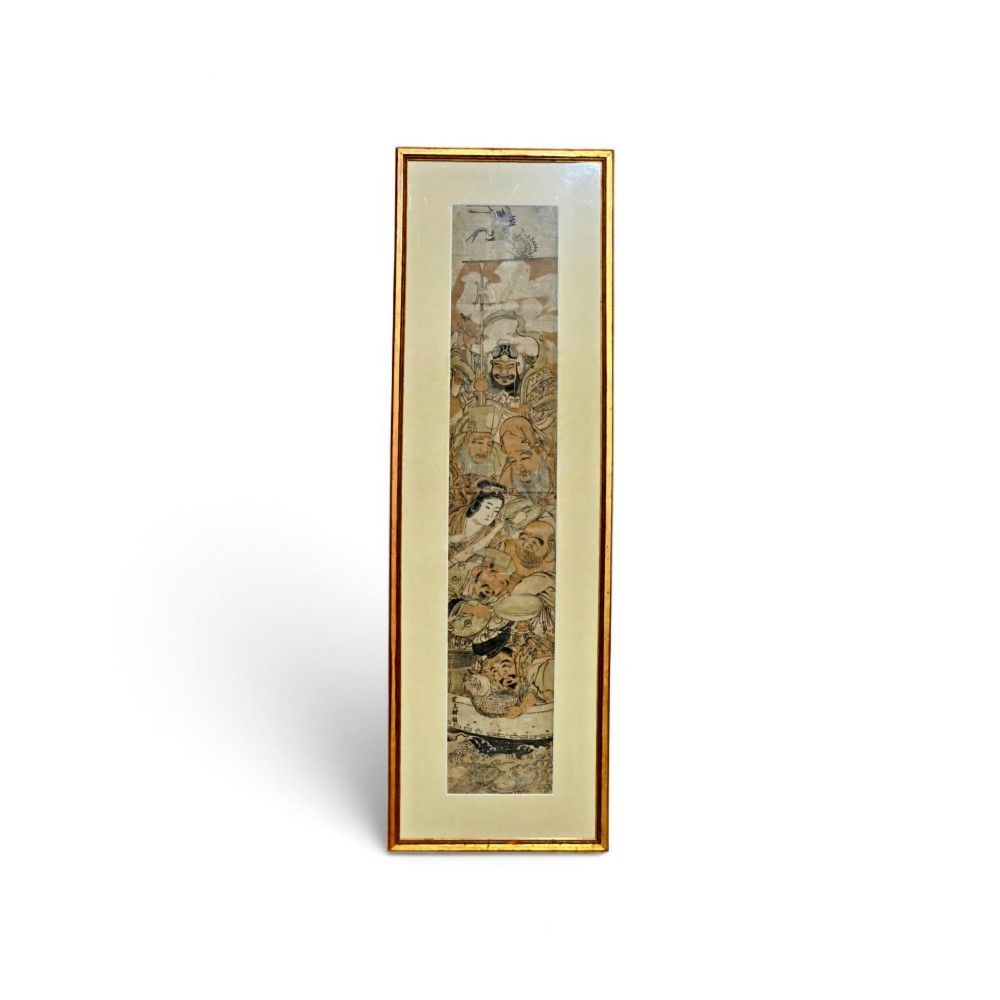 A tall framed Japanese ukiyo-e woodblock print depicting seven figures aboard a vessel beneath a flying crane, presented in a gold frame with a wide cream mount. View II