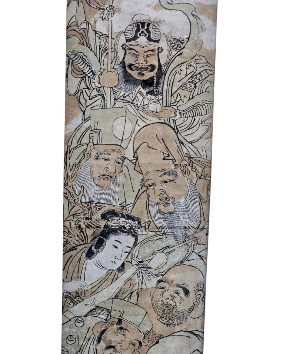 A tall framed Japanese ukiyo-e woodblock print depicting seven figures aboard a vessel beneath a flying crane, presented in a gold frame with a wide cream mount. View III