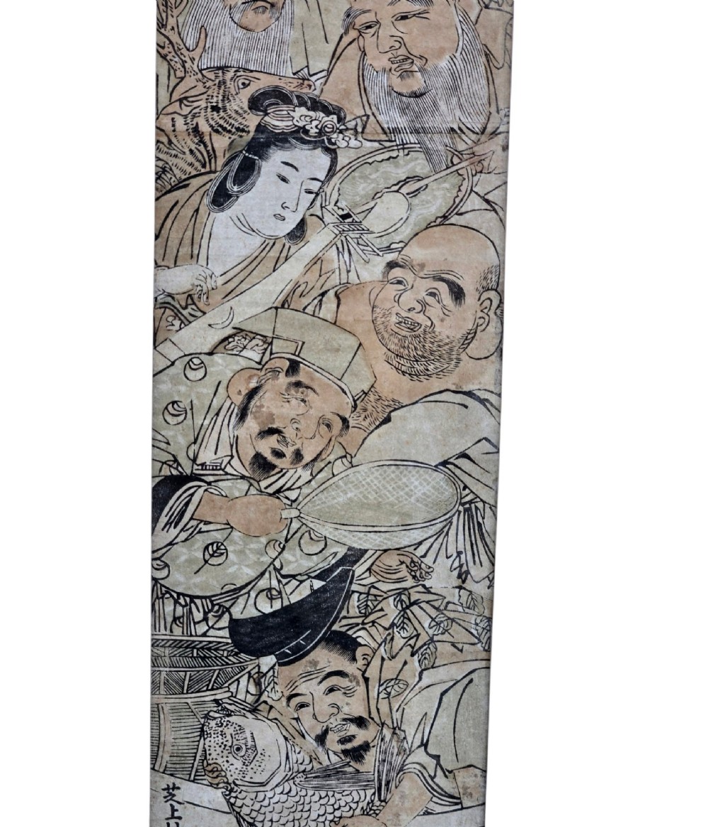 A tall framed Japanese ukiyo-e woodblock print depicting seven figures aboard a vessel beneath a flying crane, presented in a gold frame with a wide cream mount. View IV