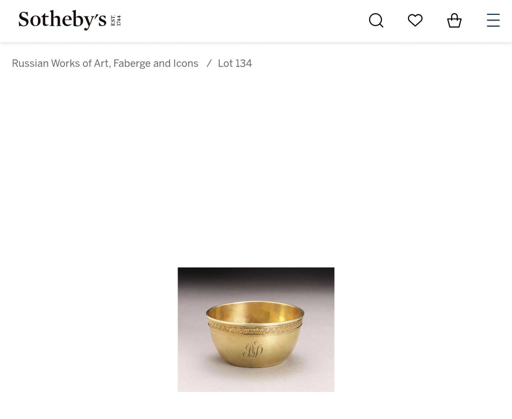 A circular gold silver-gilt presentation bowl featuring an engraved monogram and a carved leaf border near the upper rim. View XIV