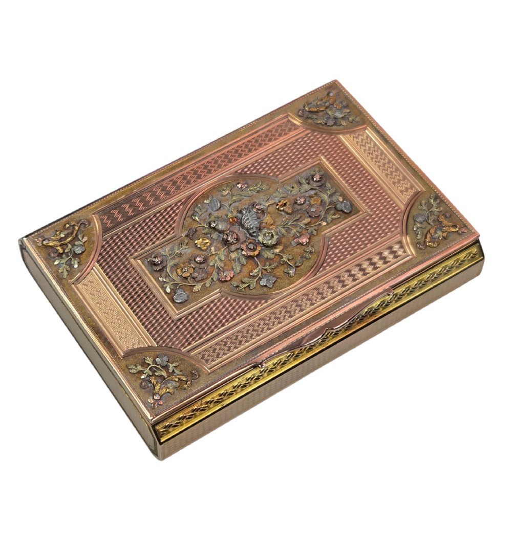 A rectangular nineteenth-century vari-colour 18ct gold snuff box featuring engine-turned guilloche patterns and a central raised floral relief panel. View III
