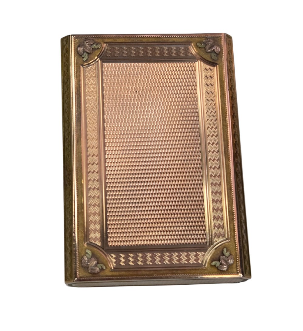 A rectangular nineteenth-century vari-colour 18ct gold snuff box featuring engine-turned guilloche patterns and a central raised floral relief panel. View VIII