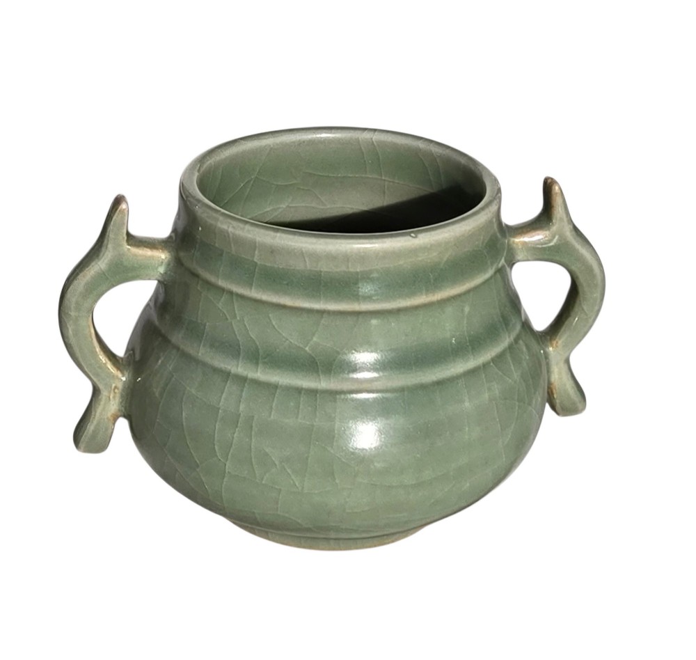 A celadon green crackle-glazed ceramic incense burner with two loop handles and raised horizontal bands. View IV