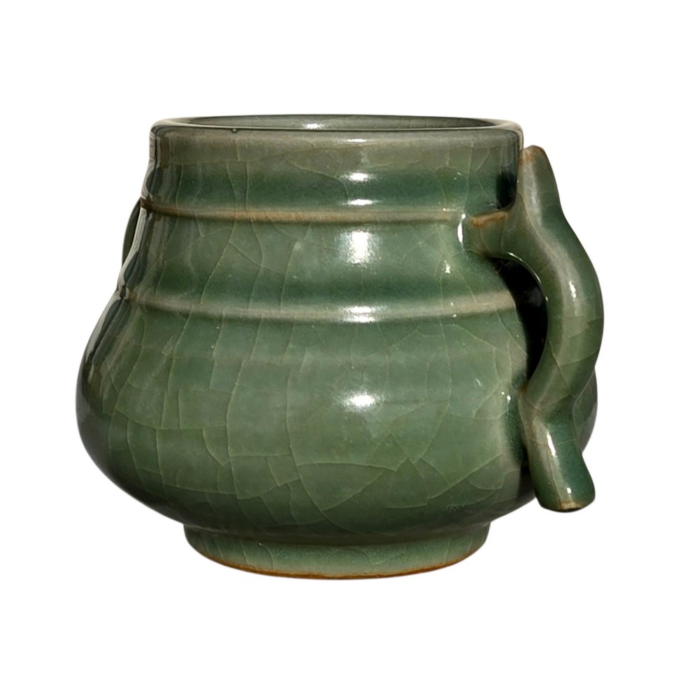 A celadon green crackle-glazed ceramic incense burner with two loop handles and raised horizontal bands. View V