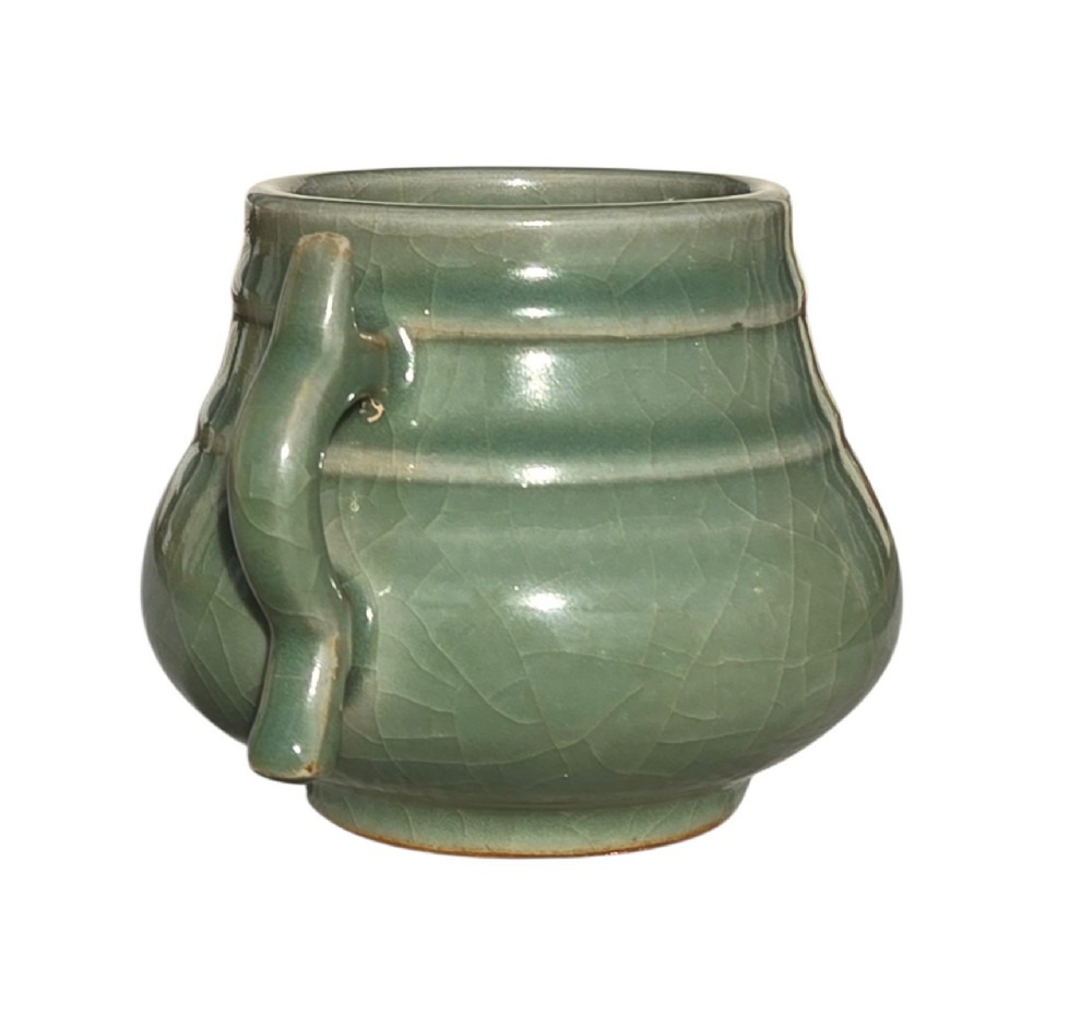 A celadon green crackle-glazed ceramic incense burner with two loop handles and raised horizontal bands. View VI