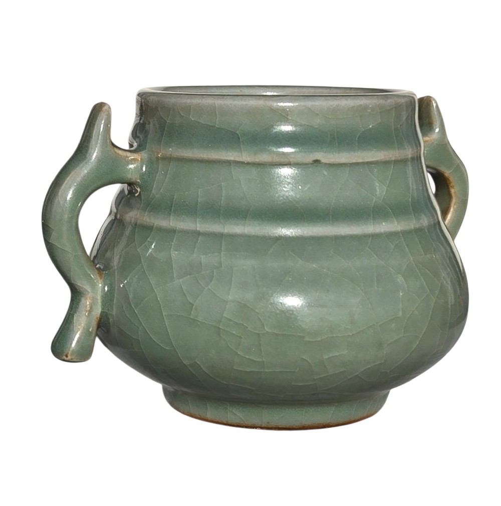 A celadon green crackle-glazed ceramic incense burner with two loop handles and raised horizontal bands. View VII