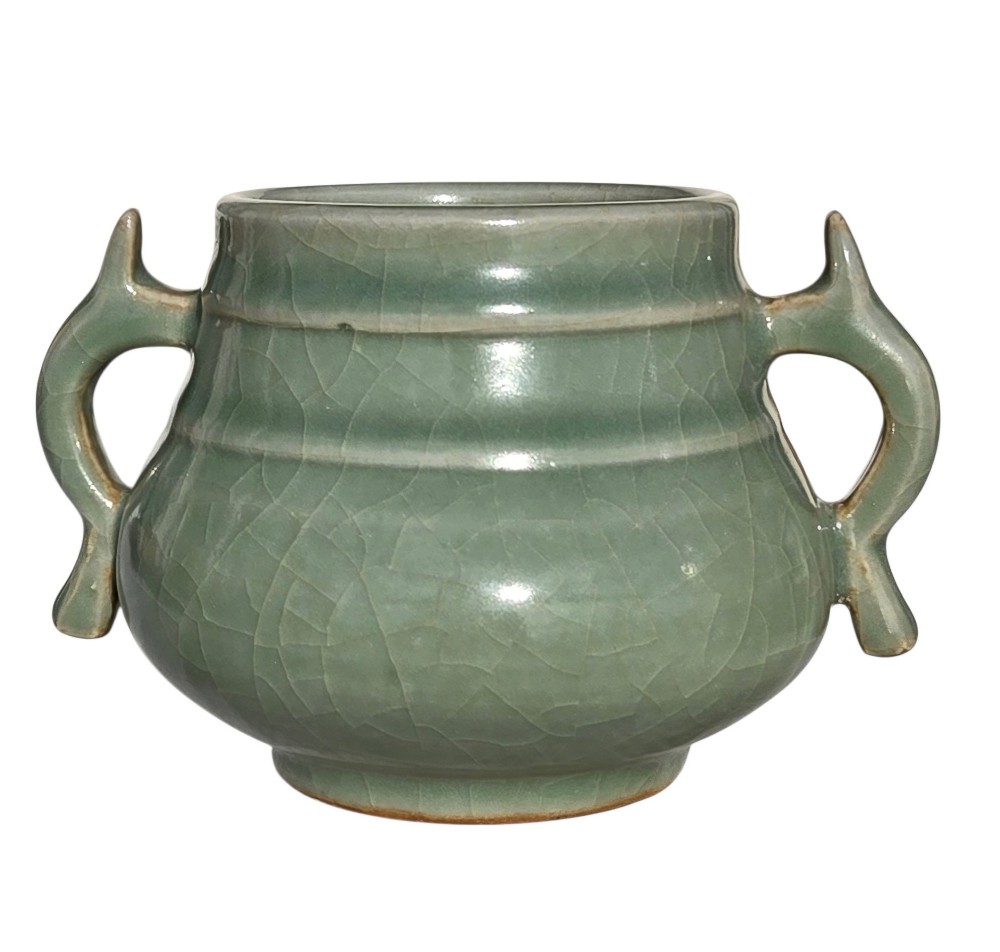 A celadon green crackle-glazed ceramic incense burner with two loop handles and raised horizontal bands. View VIII