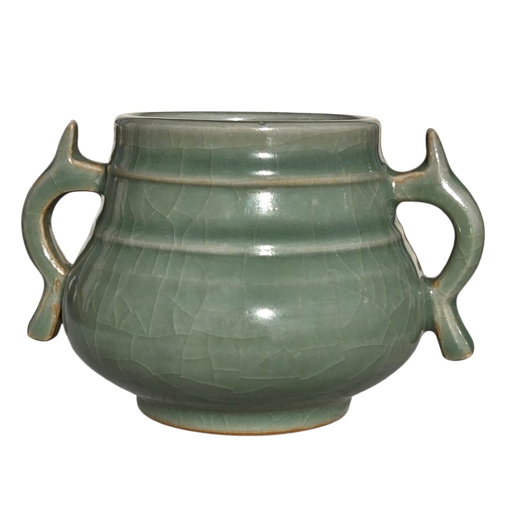 A celadon green crackle-glazed ceramic incense burner with two loop handles and raised horizontal bands. View IX