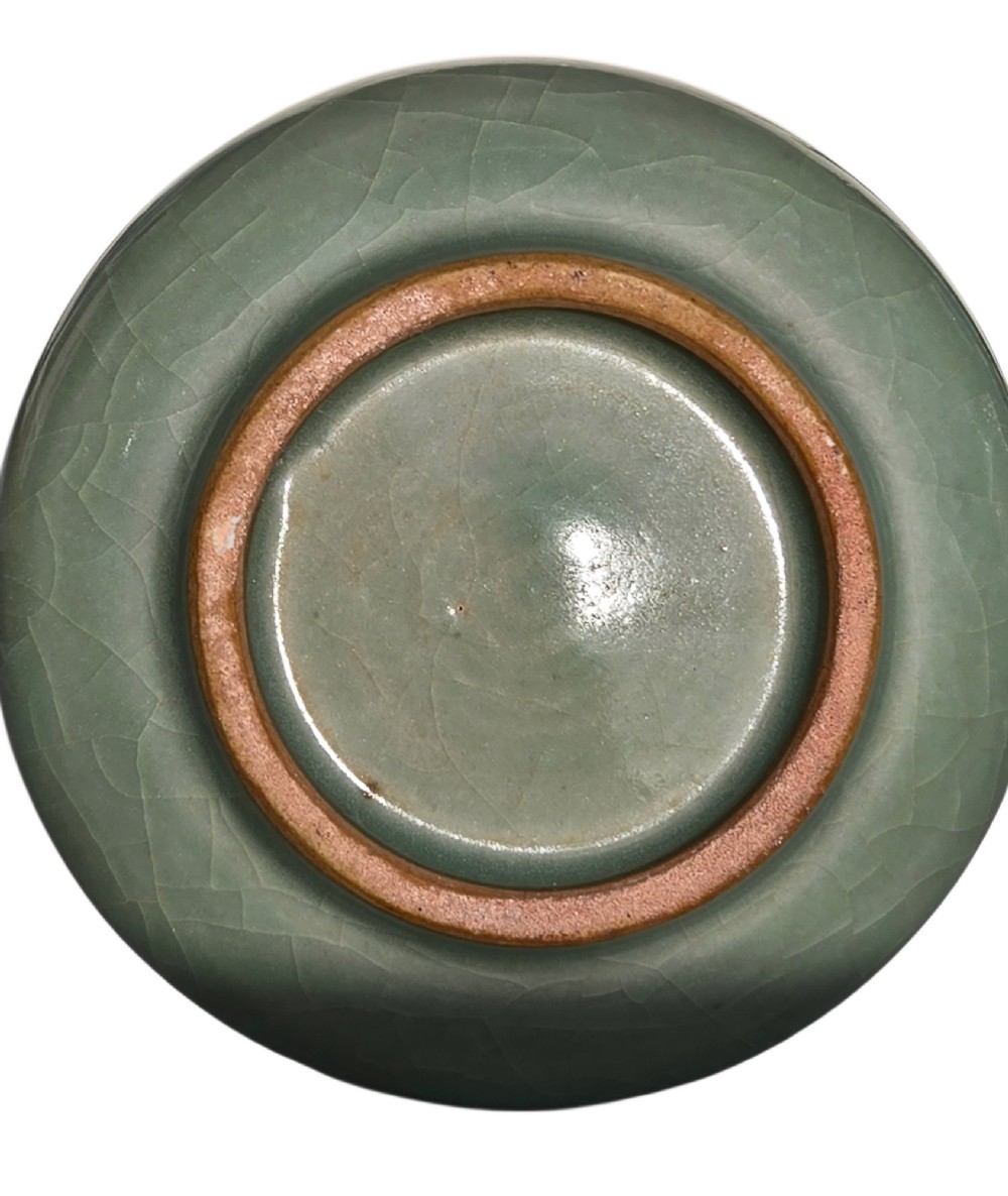 A celadon green crackle-glazed ceramic incense burner with two loop handles and raised horizontal bands. View XI