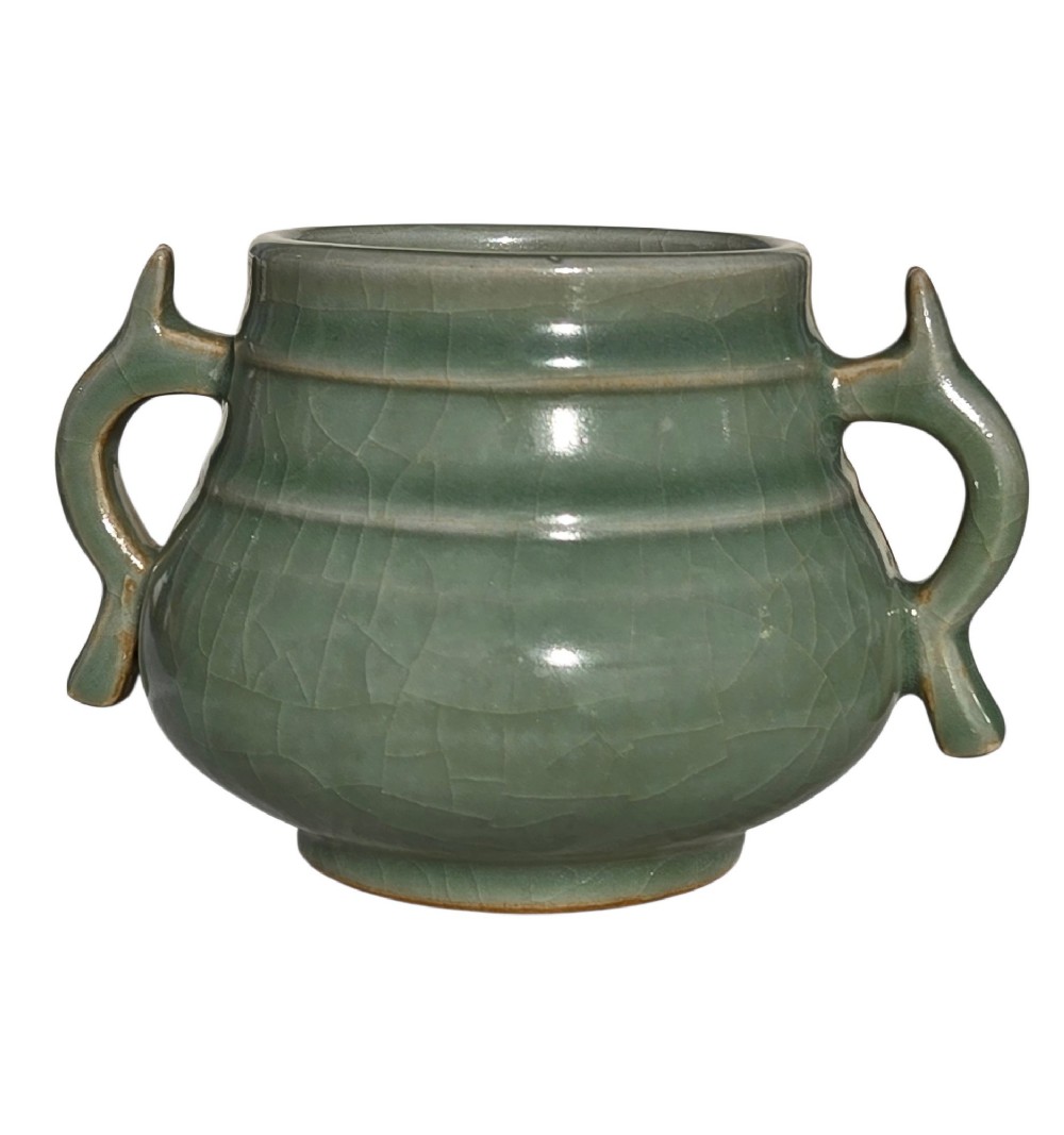 A celadon green crackle-glazed ceramic incense burner with two loop handles and raised horizontal bands. View XII