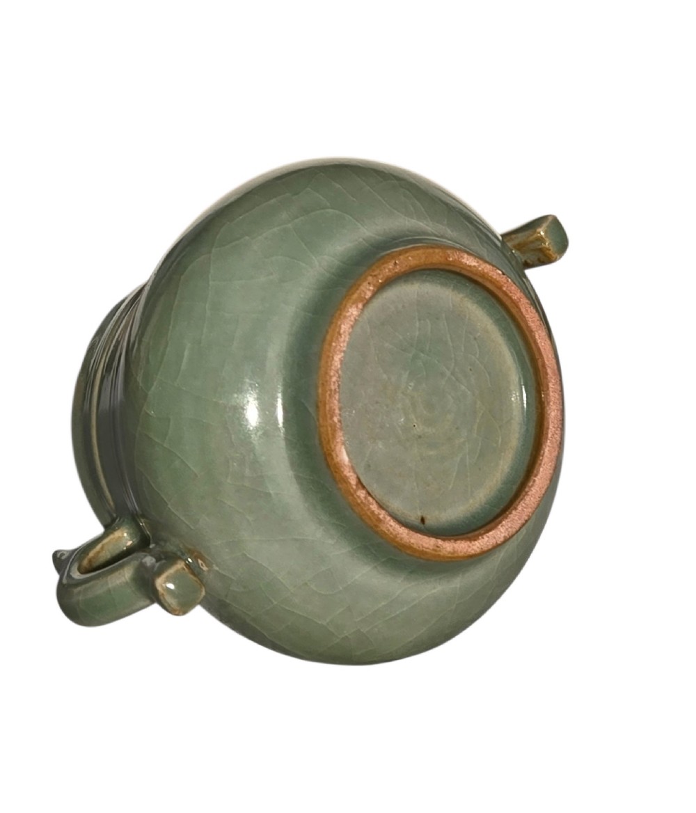 A celadon green crackle-glazed ceramic incense burner with two loop handles and raised horizontal bands. View XIV