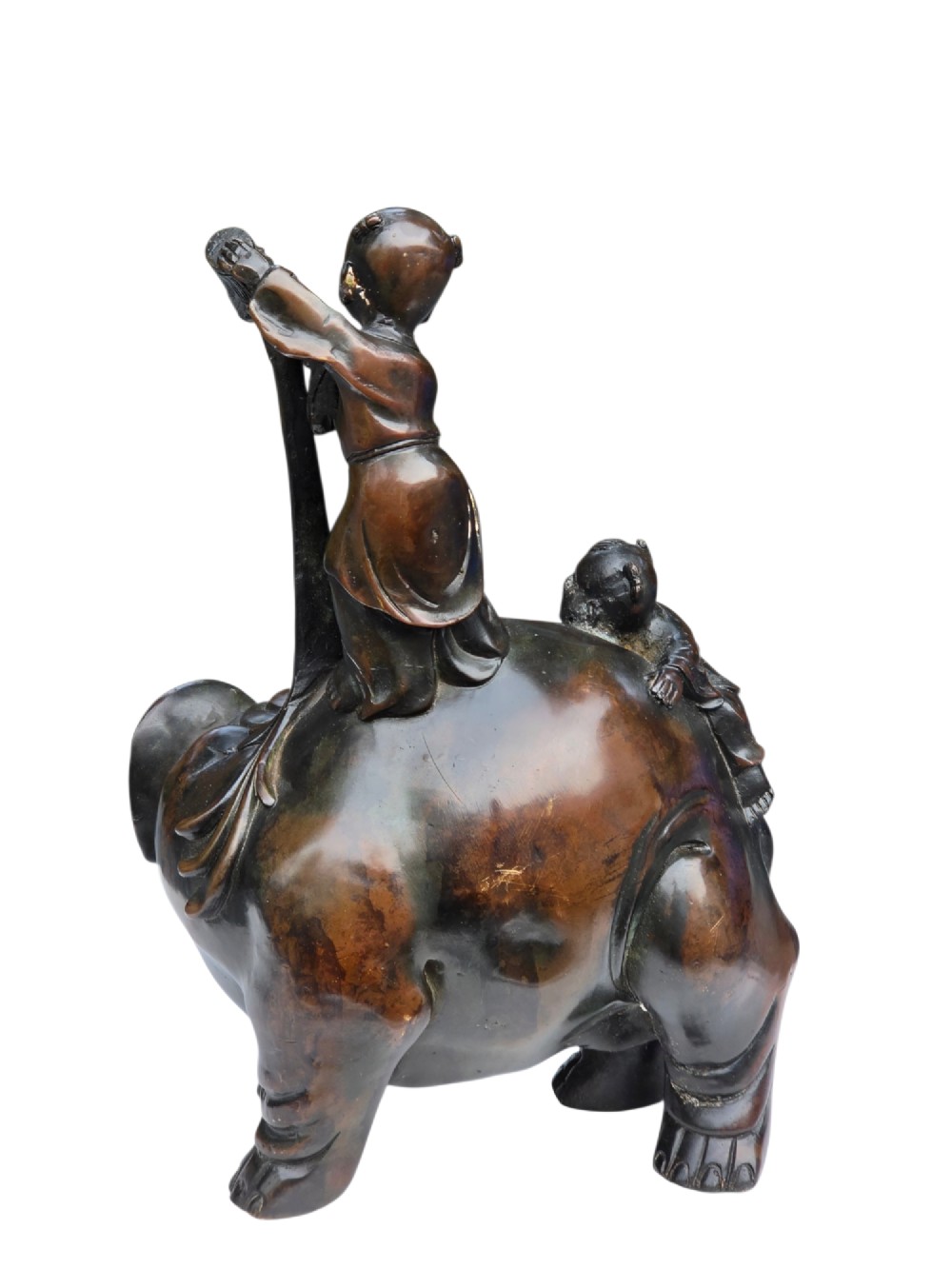 A dark patinated bronze Chinese sculpture depicting two young boys washing a caparisoned elephant. View II