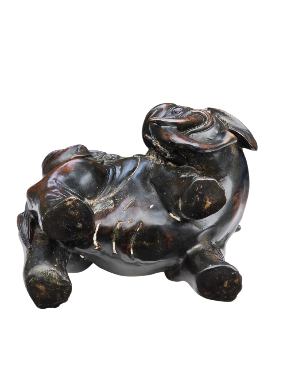 A dark patinated bronze Chinese sculpture depicting two young boys washing a caparisoned elephant. View IV