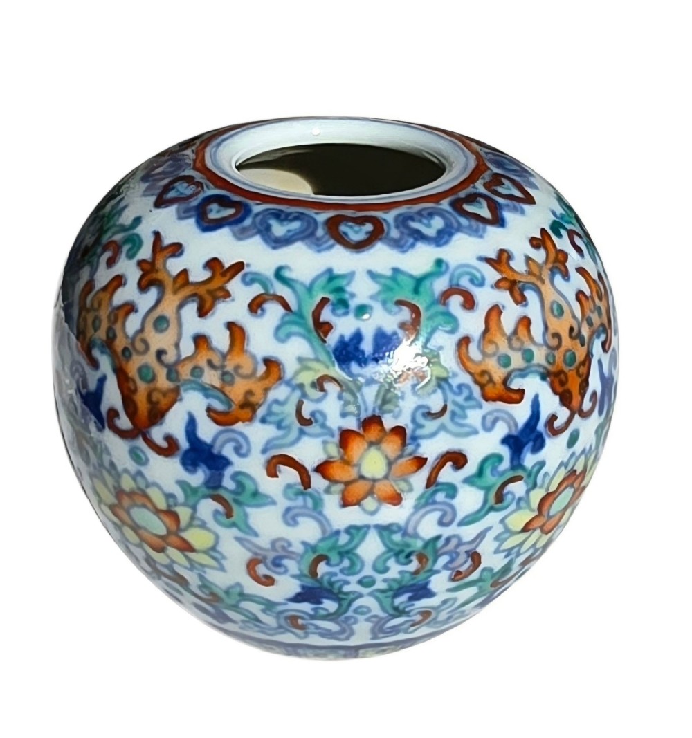 A rounded Chinese porcelain water pot decorated in doucai enamels with lotus flowers, bats, and scrolling foliage. View XIII