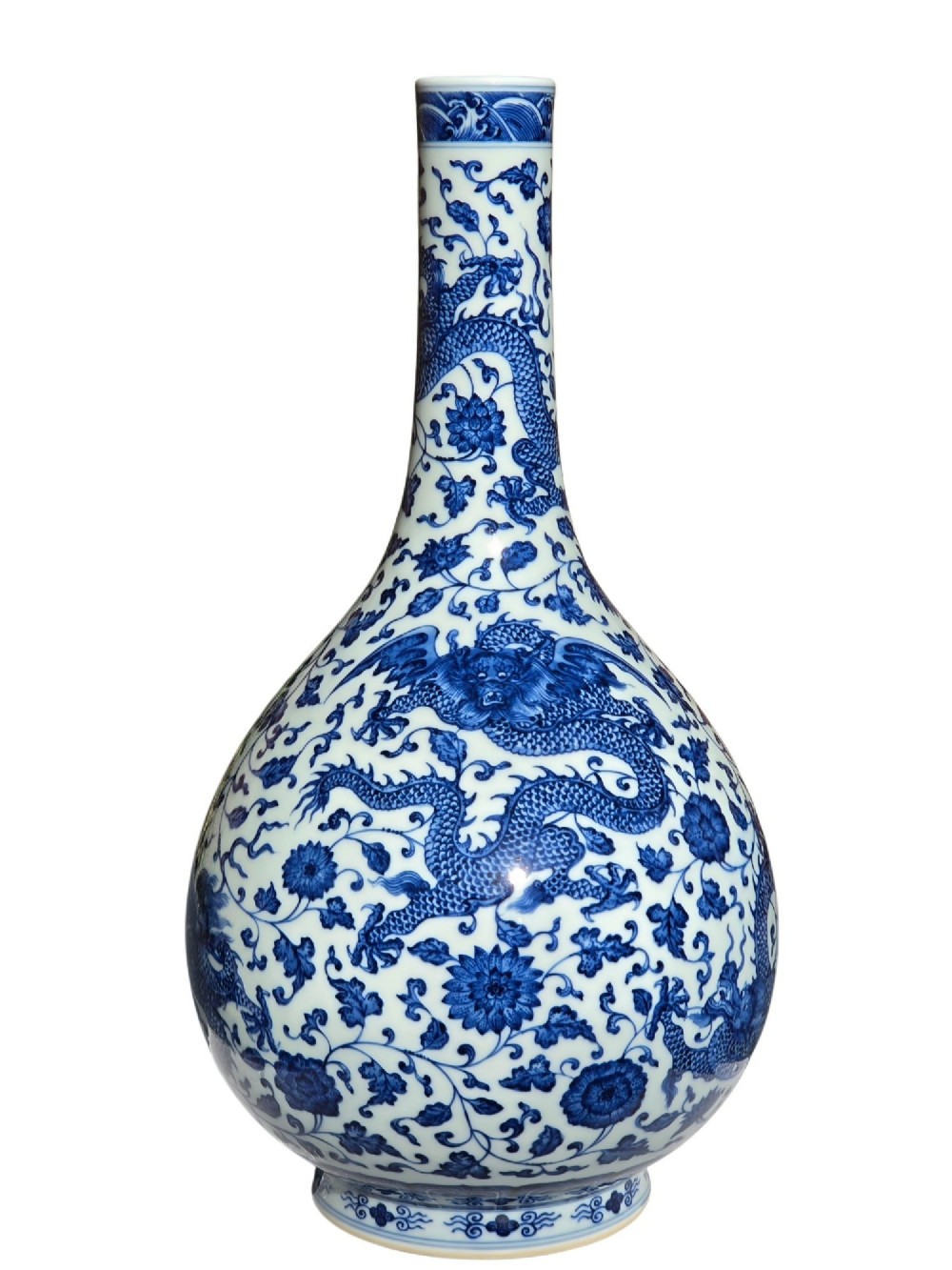 A pear-shaped Chinese porcelain bottle vase decorated with detailed underglaze cobalt blue five-clawed dragons amidst floral scrolls. View V