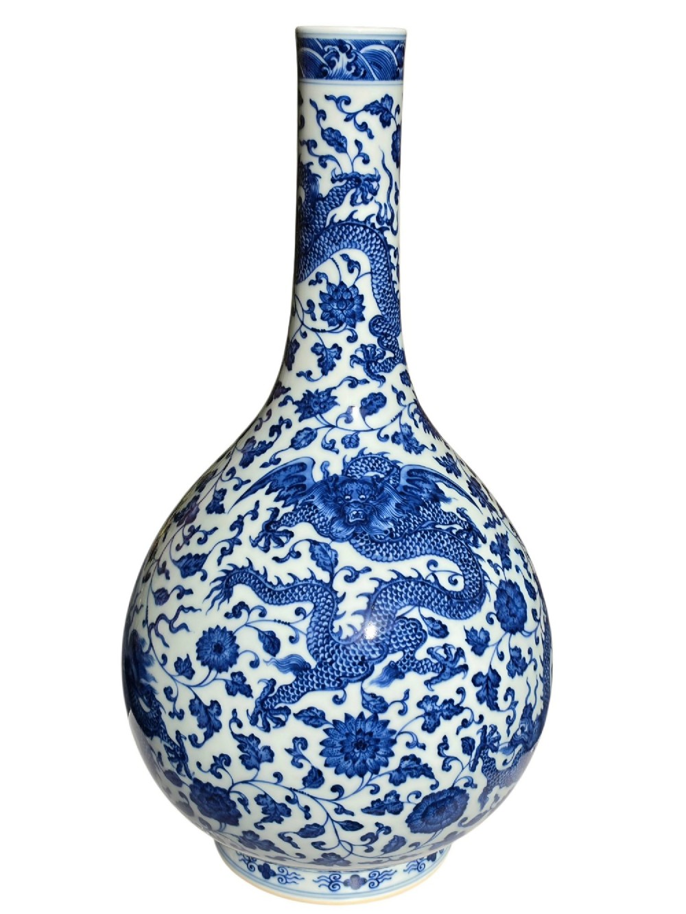 A pear-shaped Chinese porcelain bottle vase decorated with detailed underglaze cobalt blue five-clawed dragons amidst floral scrolls. View VIII