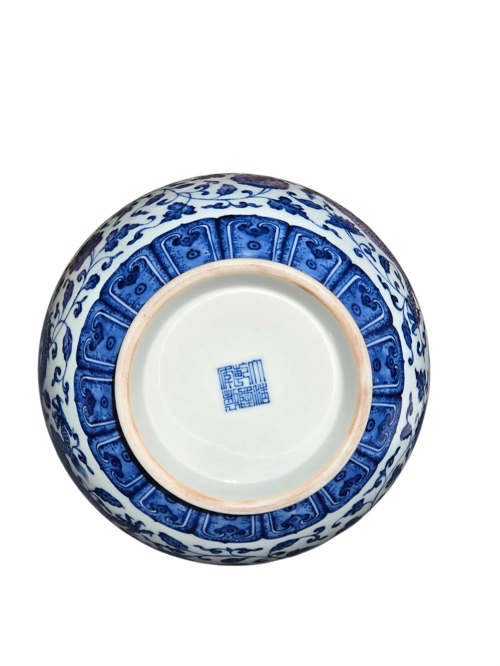 A pear-shaped Chinese porcelain bottle vase decorated with detailed underglaze cobalt blue five-clawed dragons amidst floral scrolls. View XII