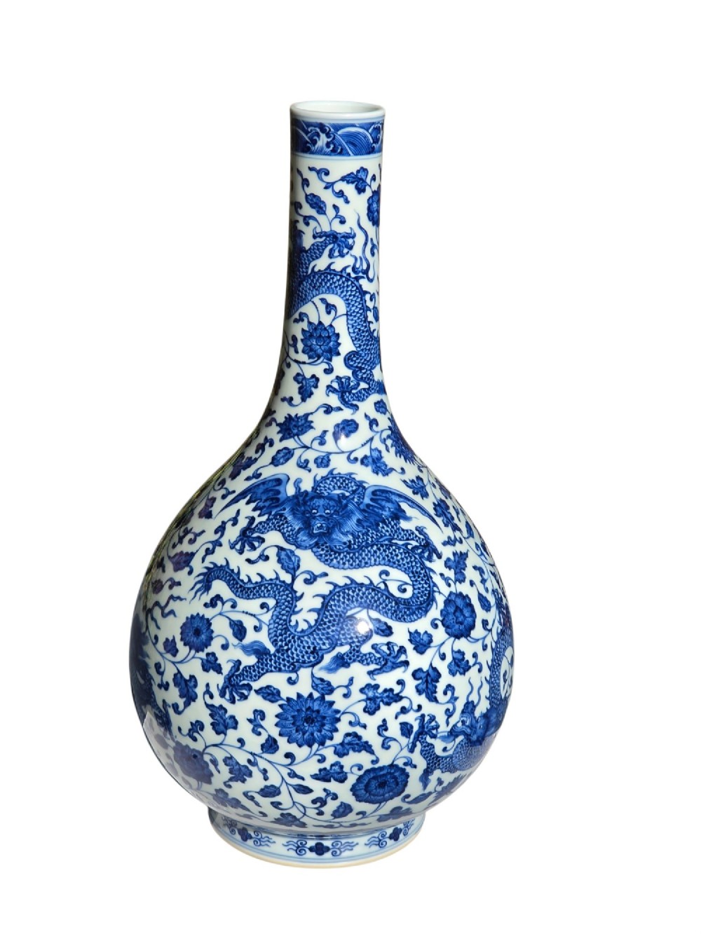 A pear-shaped Chinese porcelain bottle vase decorated with detailed underglaze cobalt blue five-clawed dragons amidst floral scrolls. View XIII