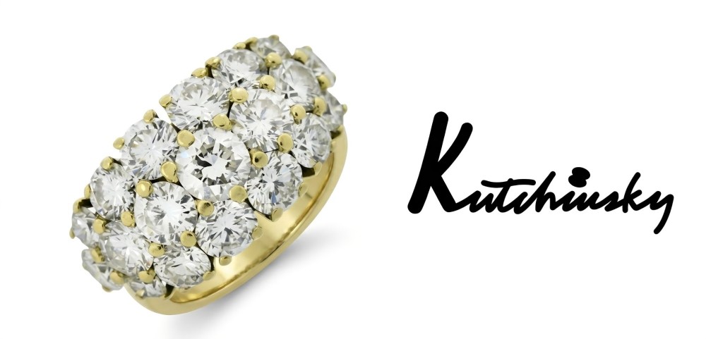 An 18ct yellow gold dome cluster ring closely set with multiple round brilliant cut diamonds in claw settings. View VIII