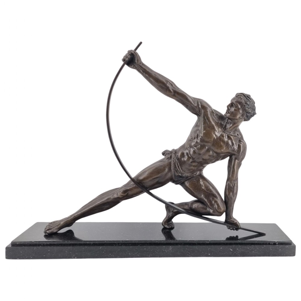 An Art Deco dark bronze sculpture depicting a muscular male athlete bending an iron bar, mounted on a black marble plinth.