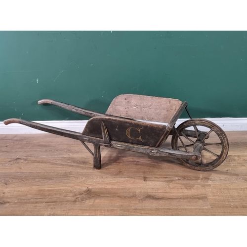 A SMALL PAINTED WOODEN WHEELBARROW C1830