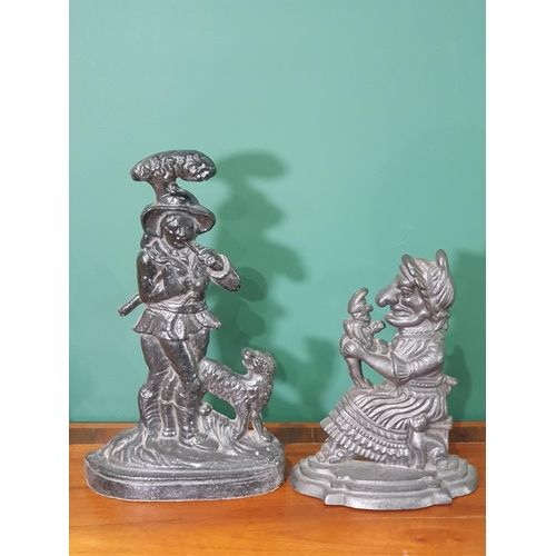 TWO CAST IRON DOORSTOPS C 1880