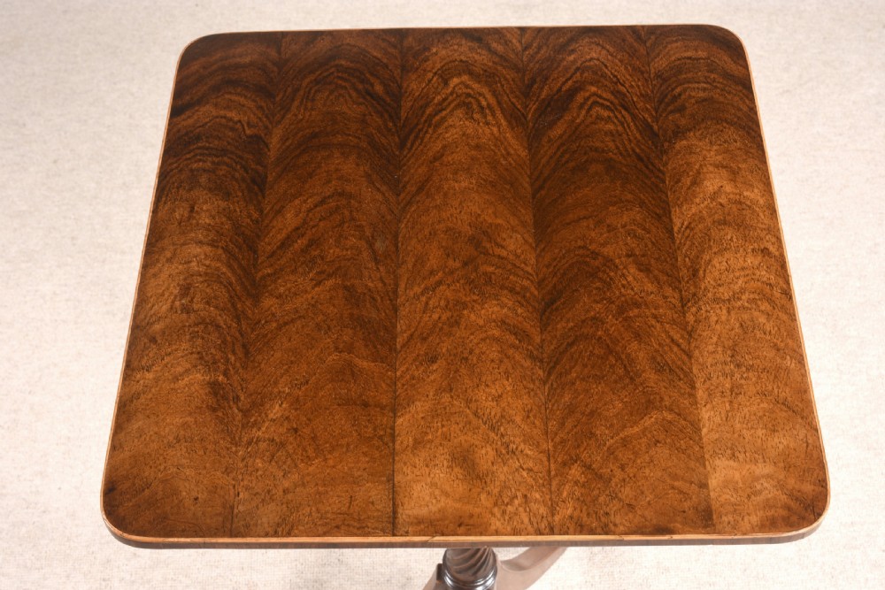 A mahogany tripod occasional table featuring a square top with rounded corners, a spiral-turned central column, and three splayed legs. View II