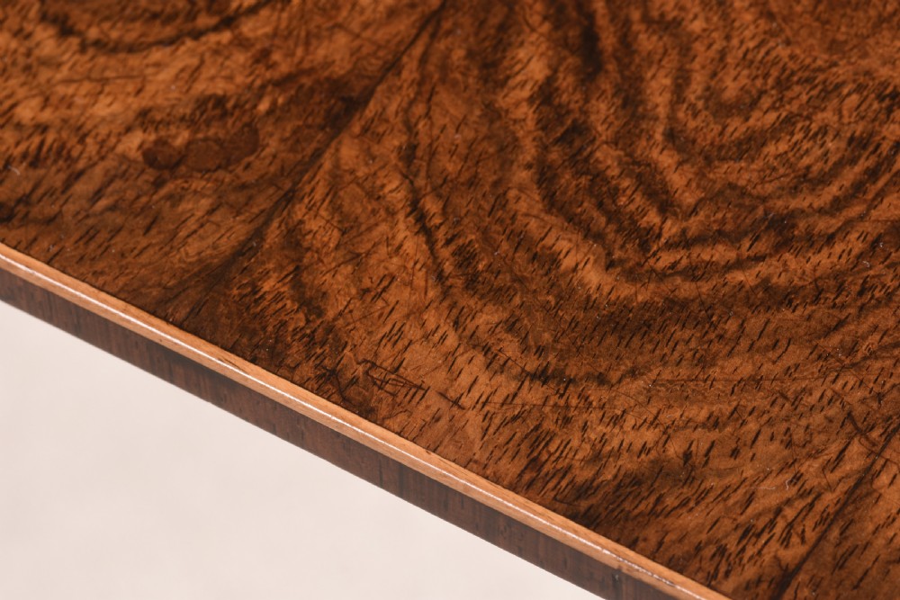 A mahogany tripod occasional table featuring a square top with rounded corners, a spiral-turned central column, and three splayed legs. View V