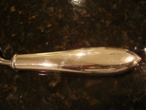 fig 1. 20th century American sterling silver handled unusual cake slice.