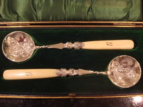 fig 1. Lovely Victorian silver plate and ivory set of serving spoons in the original striking fitted case.