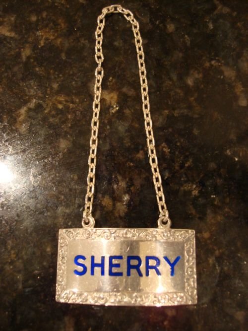 SUPERIOR QUALITY SOLID SILVER SHERRY LABEL MADE BY FAMOUS MAKERS MAPPIN AND WEBB
