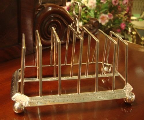 fig 1. Circa 1875 large and stylish silver plate toast rack/letter rack by famous makers Hukin and Heath.