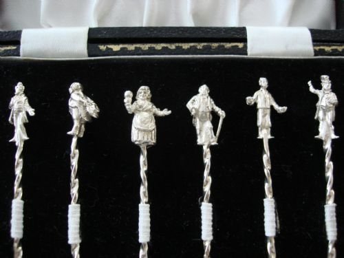 fig 1. Cast solid silver cased fruit or cocktail sticks in original fitted case.