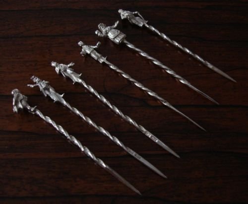 fig 2. Cast solid silver cased fruit or cocktail sticks in original fitted case.