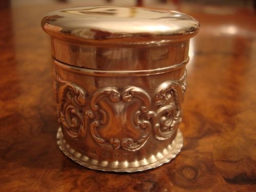 fig 1. Birmingham 1899 solid silver cherub dressing table jar or vanity pot.