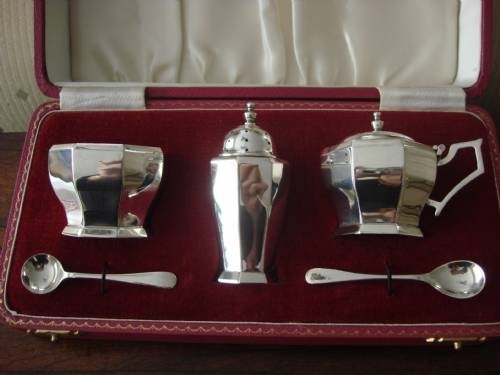 fig 1. Birmingham 1959/60 solid silver unusual shaped complete condiment or cruet set in the original case.