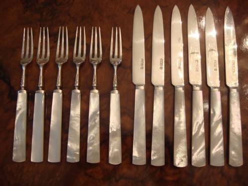 fig 1. Sheffield 1912 solid silver and mother of pearl superb 12 piece fruit or dessert service in the original oak fitted case.