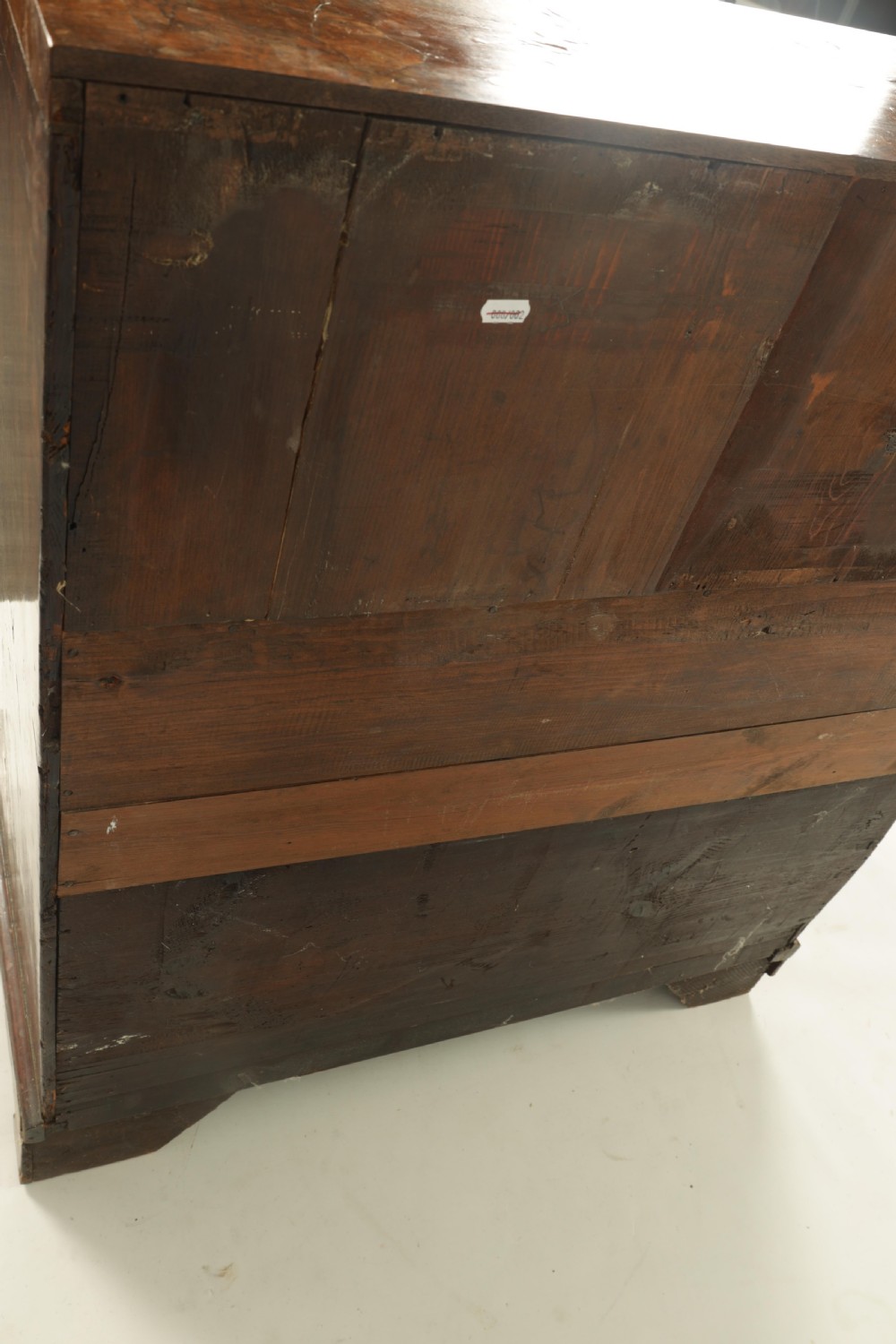 An 18th-century burr walnut bureau featuring a slant-front flap above four graduated drawers with brass handles, resting on bracket feet. View XI