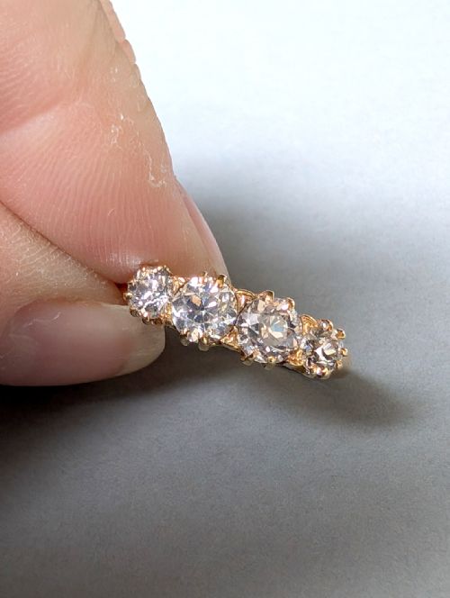 fig 4. Victorian four stone 18ct gold diamond ring