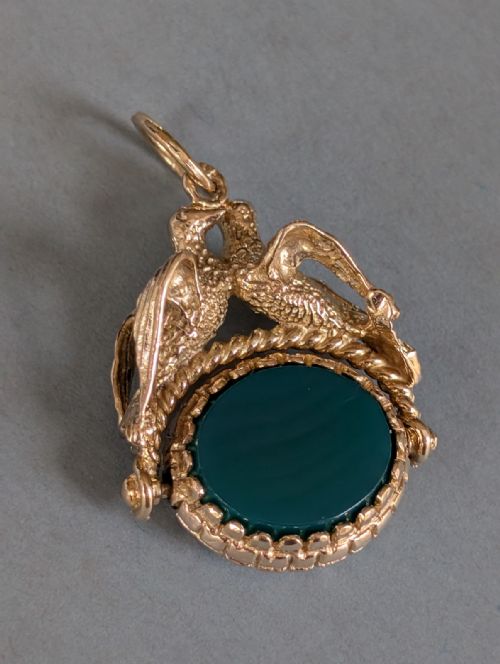 ANTIQUE 9CT GOLD SPINNING FOB WITH DOVES - ADDITIONAL PHOTO 1