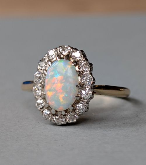 fig 1. Mid 20th century 18ct gold platinum diamond opal ring
