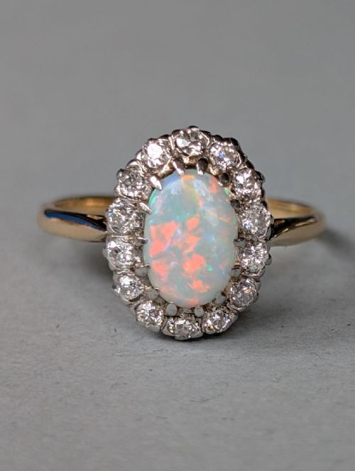 fig 2. Mid 20th century 18ct gold platinum diamond opal ring