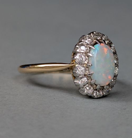 fig 3. Mid 20th century 18ct gold platinum diamond opal ring
